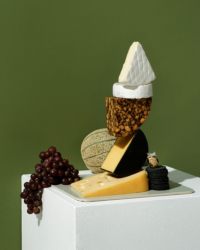stacked cheese sculpture conceptual still life by camilo mateus